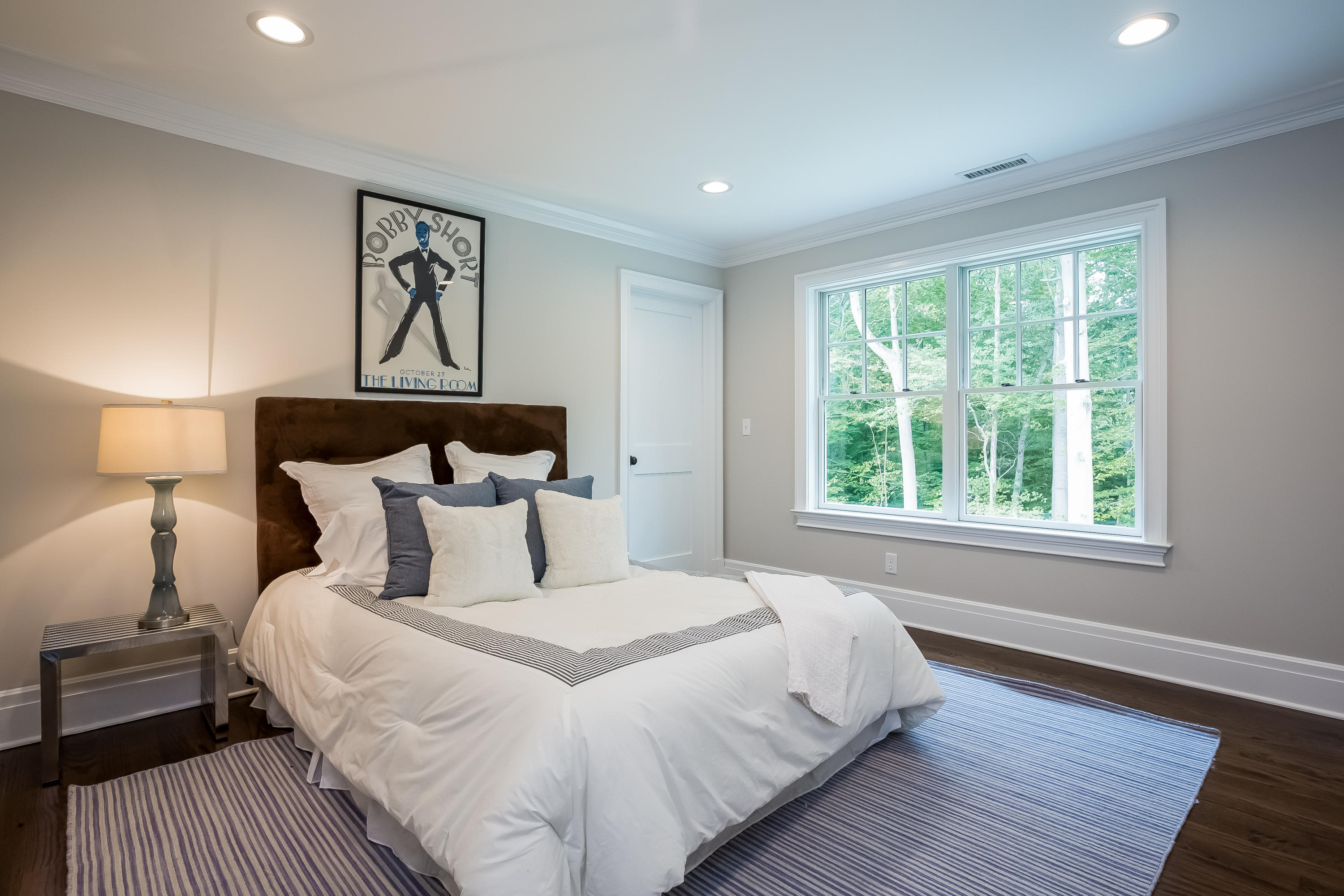 35 Old Parish Road Darien, CT 06820 - Photo 42 of 74 a bedroom with a bed and a night stand