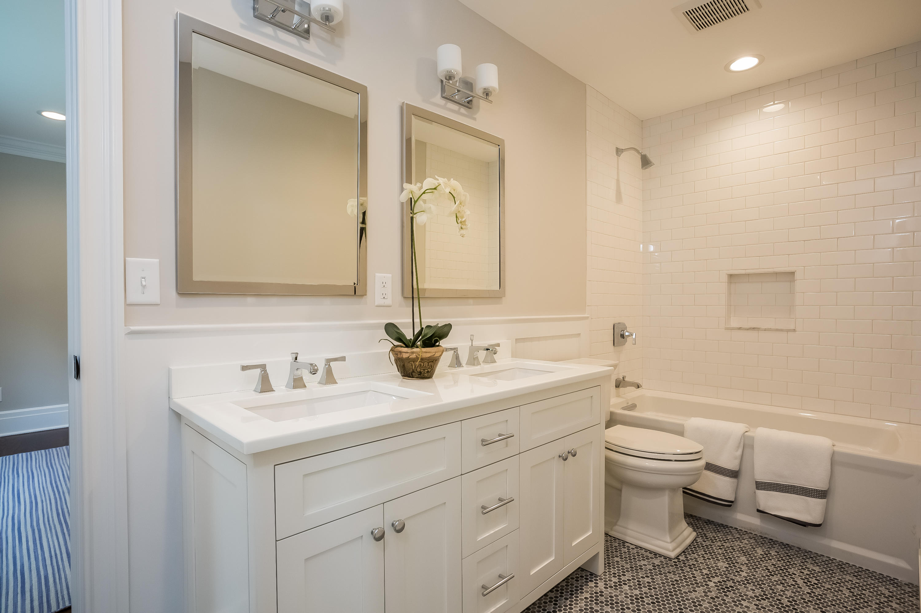 35 Old Parish Road Darien, CT 06820 - Photo 43 of 74 a bathroom with a toilet sink and mirror