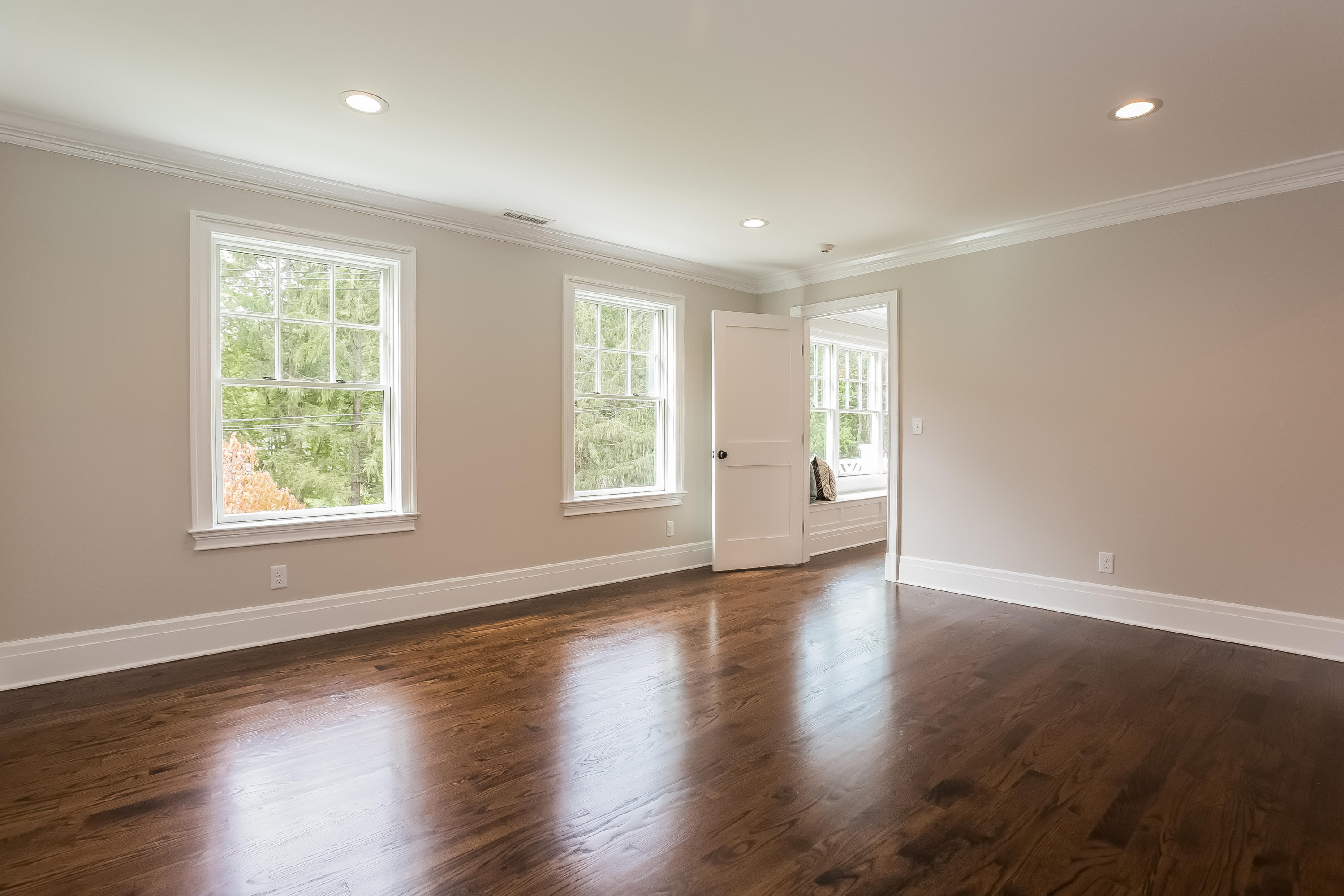 35 Old Parish Road Darien, CT 06820 - Photo 45 of 74 a view of an empty room with wooden floor and a window