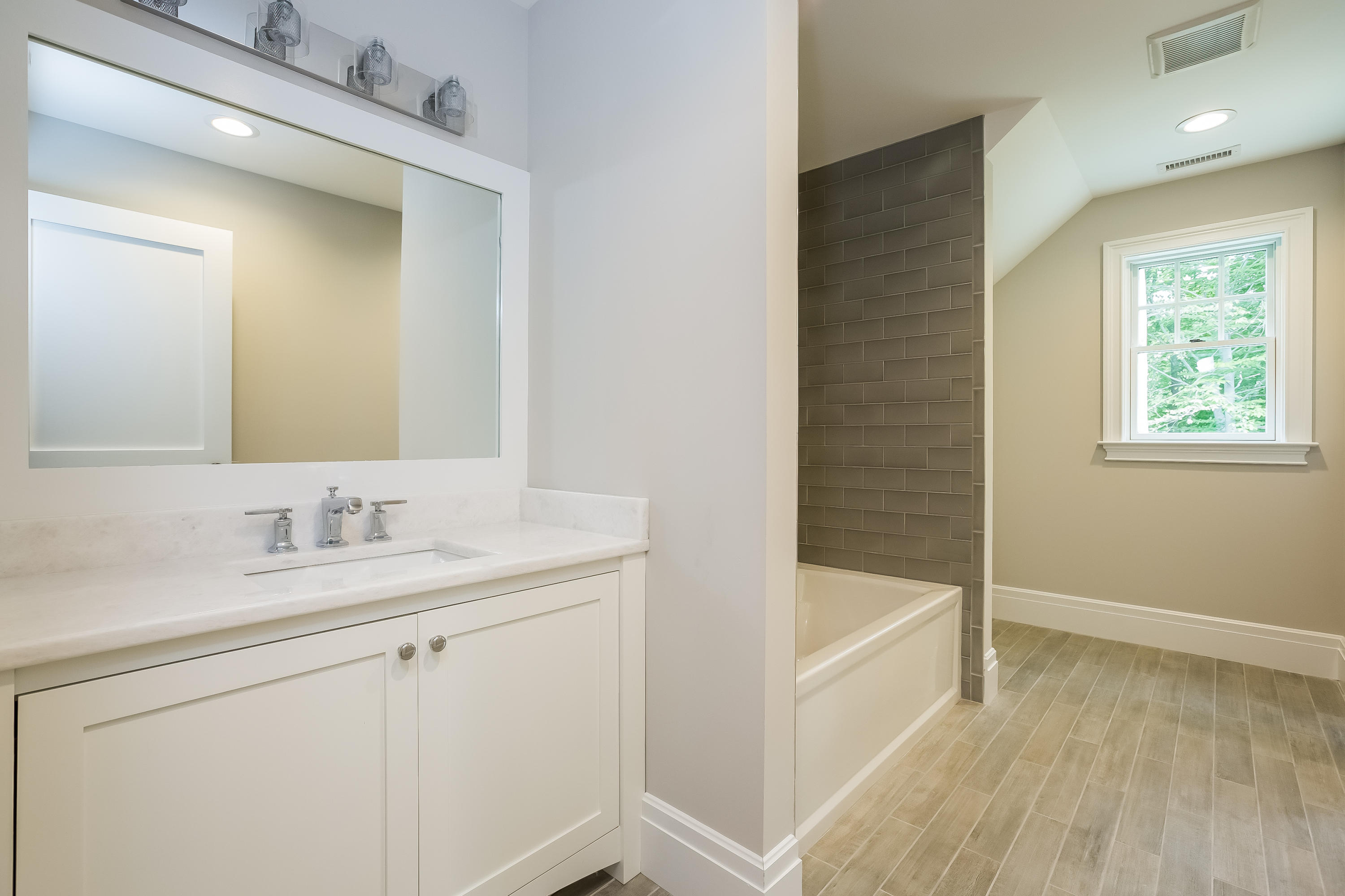 35 Old Parish Road Darien, CT 06820 - Photo 47 of 74 a bathroom with a sink a toilet and shower