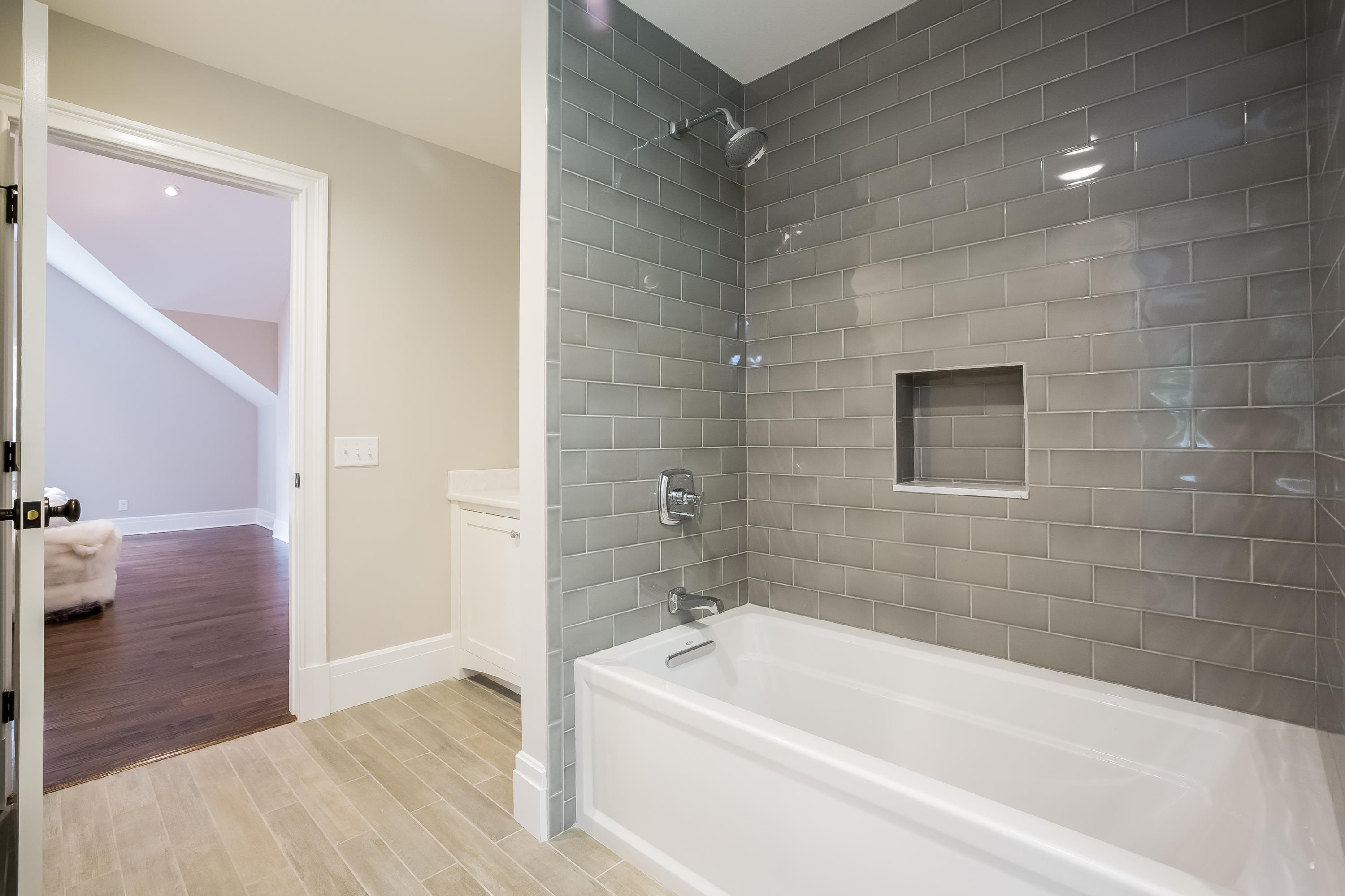 35 Old Parish Road Darien, CT 06820 - Photo 48 of 74 a bathroom with a bathtub and shower