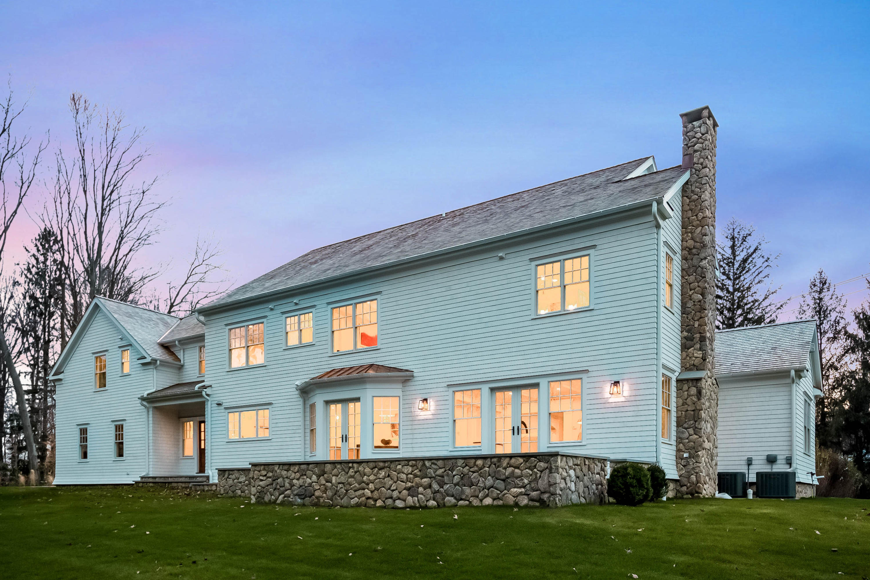 35 Old Parish Road Darien, CT 06820 - Photo 53 of 74 a front view of a house with a garden and yard