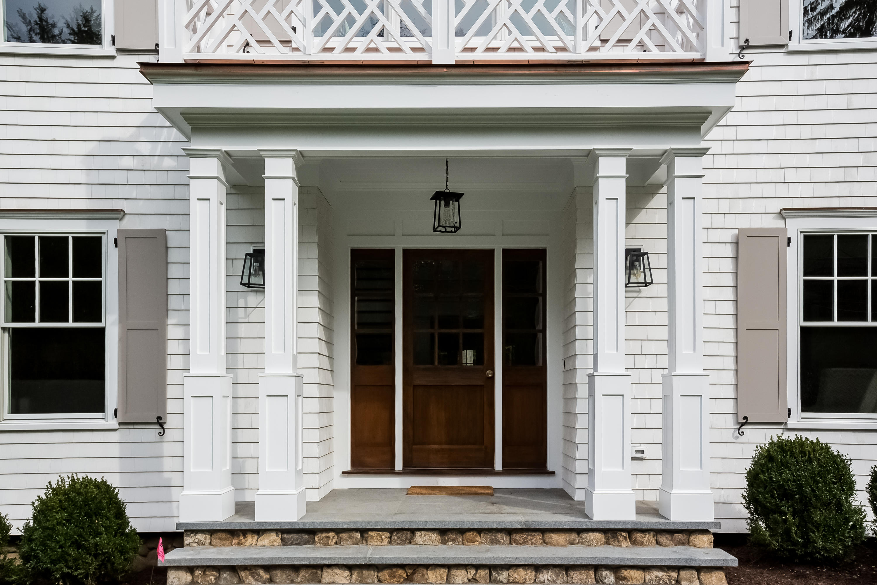 35 Old Parish Road Darien, CT 06820 - Photo 60 of 74 a front view of a house with a window and a garage
