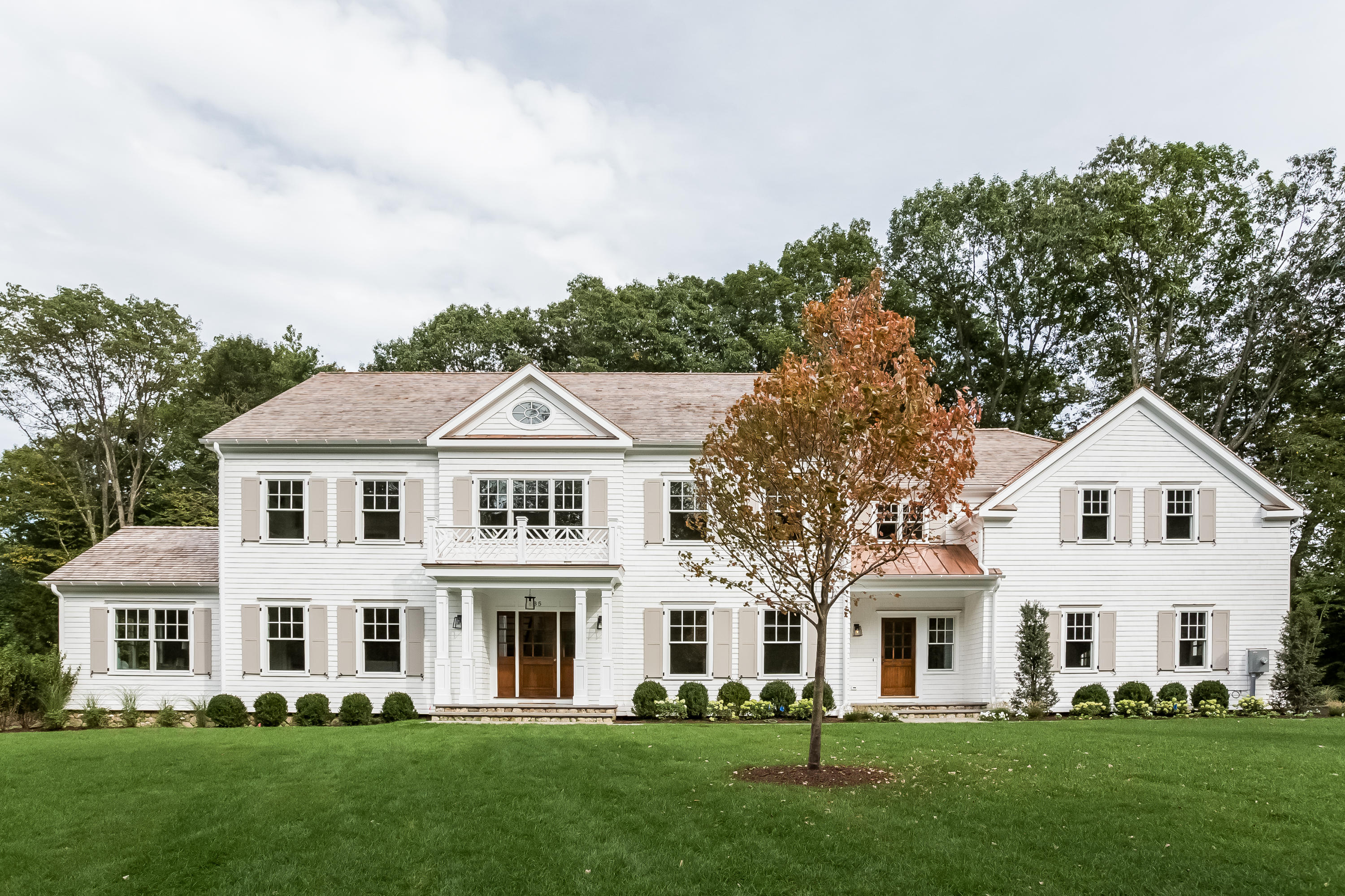 35 Old Parish Road Darien, CT 06820 - Photo 72 of 74 a front view of a house with a yard