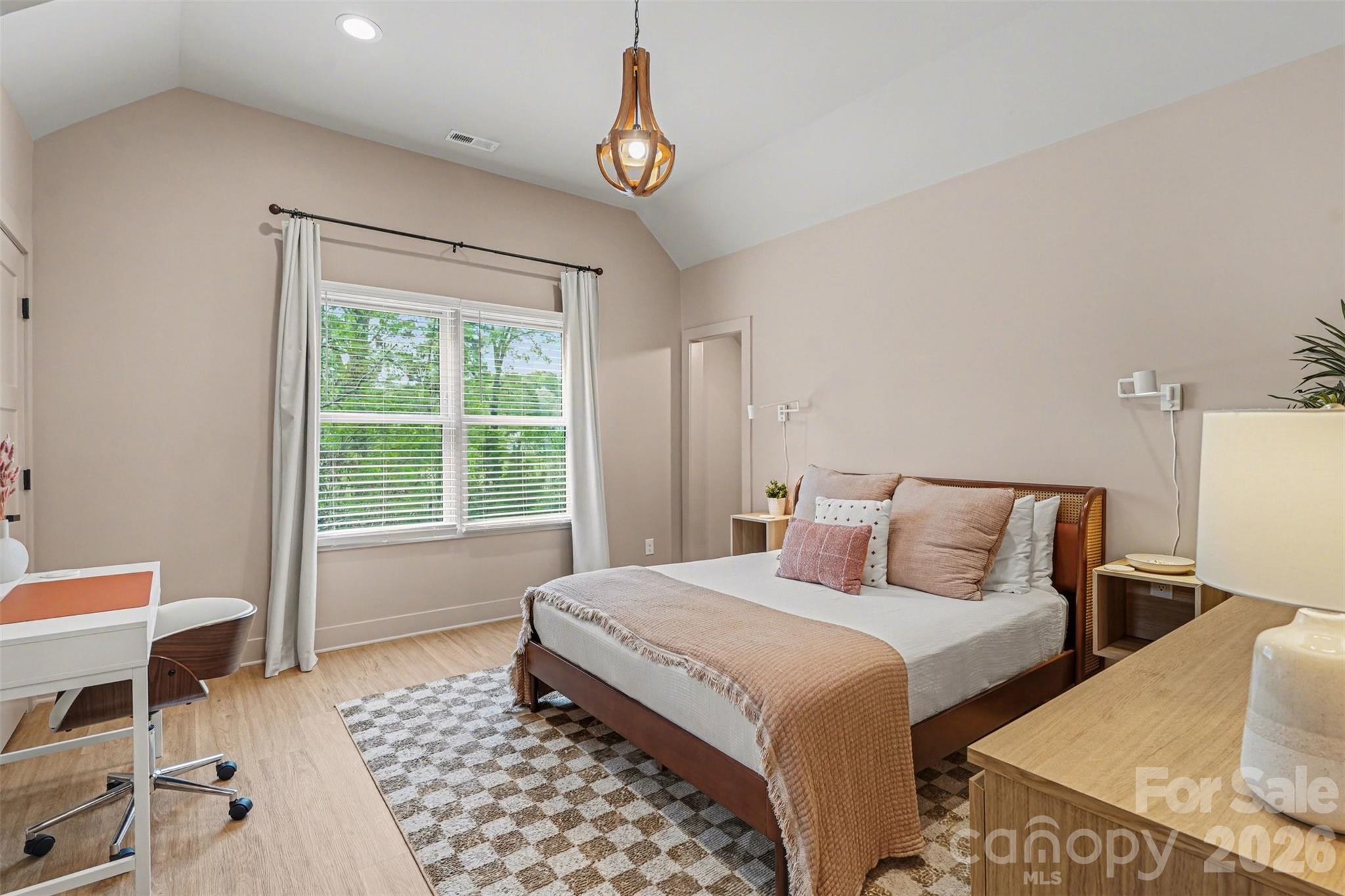 12141 Coyle Road Stanfield, NC 28163 - Photo 15 of 26 a bedroom with a bed and a window