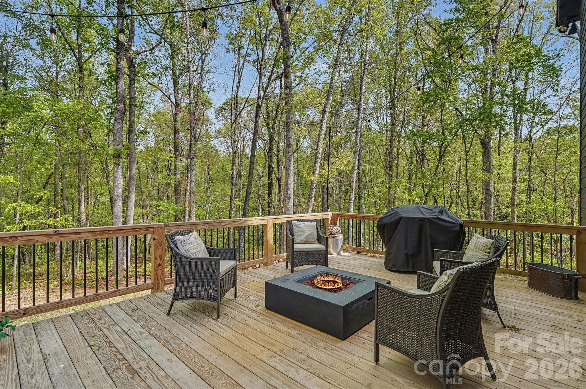 12141 Coyle Road Stanfield, NC 28163 - Photo 23 of 26 a view of a deck with furniture
