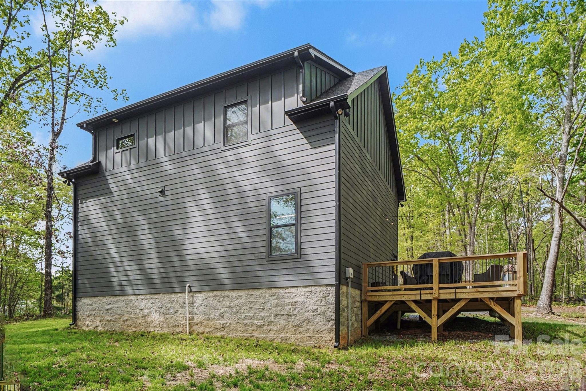 12141 Coyle Road Stanfield, NC 28163 - Photo 24 of 26 a front view of a house with garden