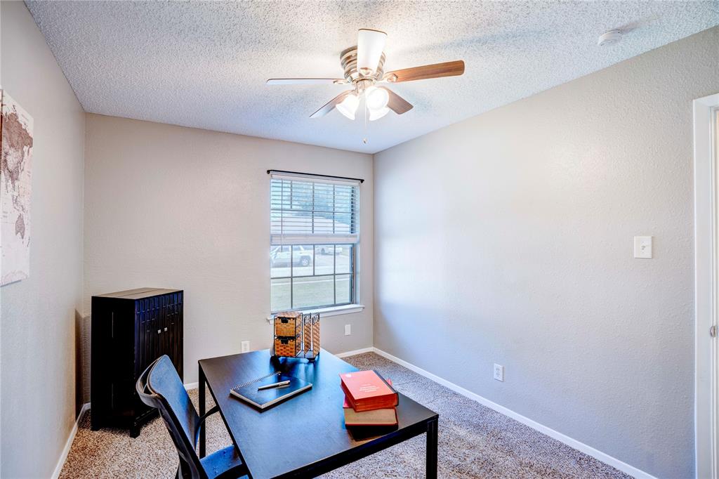 6028 Ridgecrest Drive Watauga, TX 76148 - Photo 26 of 40 a view of a workspace with furniture