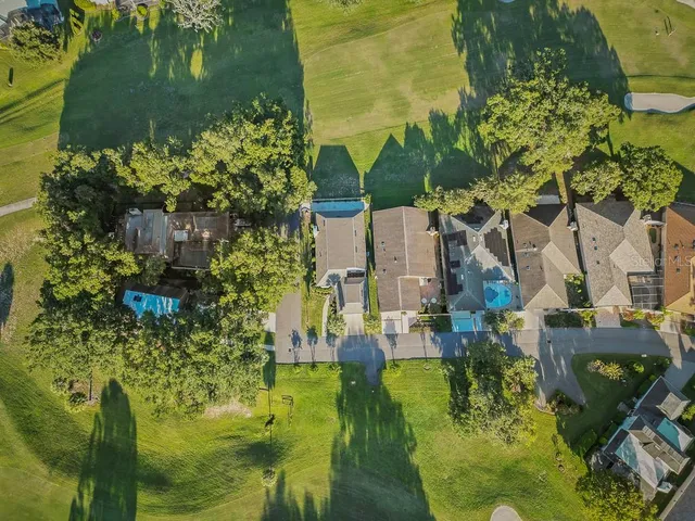 a view of residential houses with outdoor space