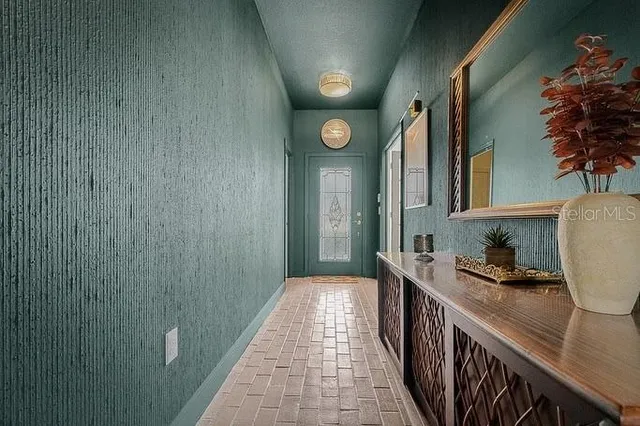 a bathroom with a sink and mirror