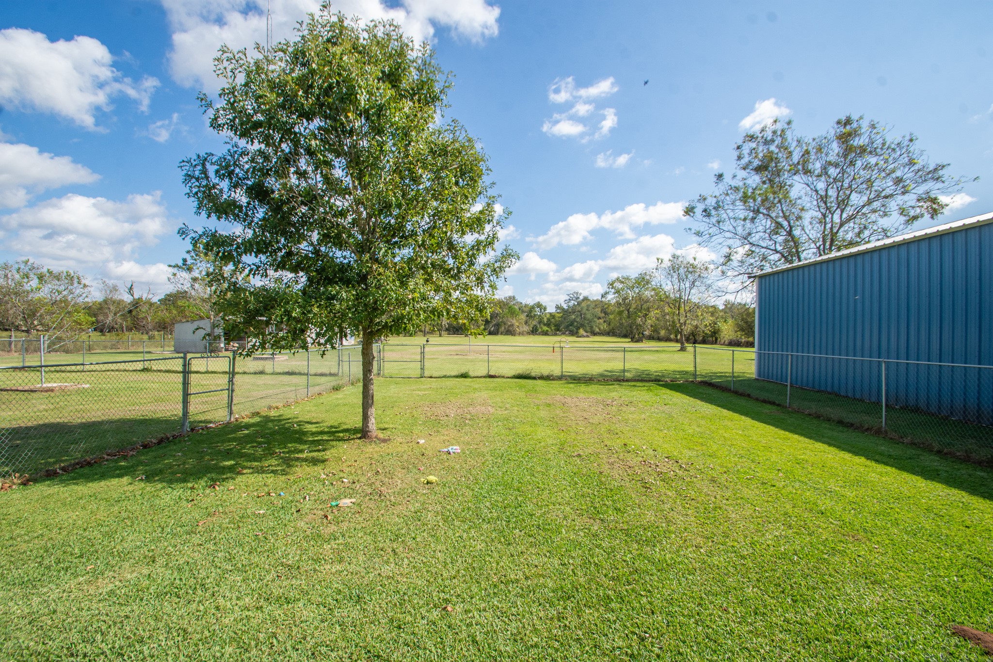 3625 County Road 36 Angleton, TX 77515 - Photo 34 of 50 a view of a yard with a slide