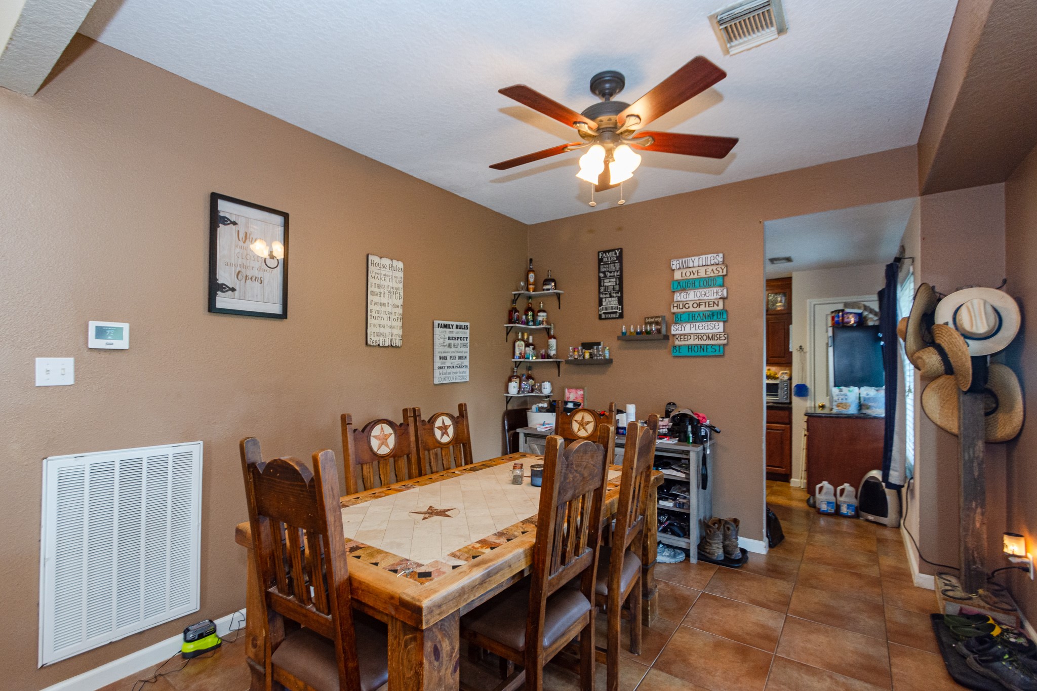3625 County Road 36 Angleton, TX 77515 - Photo 8 of 50 a view of a dining room with furniture and wooden floor