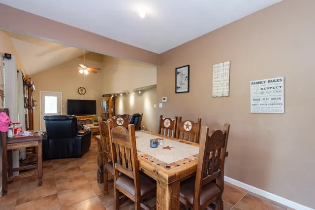 a view of a dining room with furniture