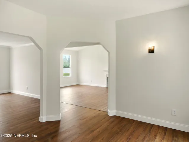 a white bath tub sitting in a bathroom