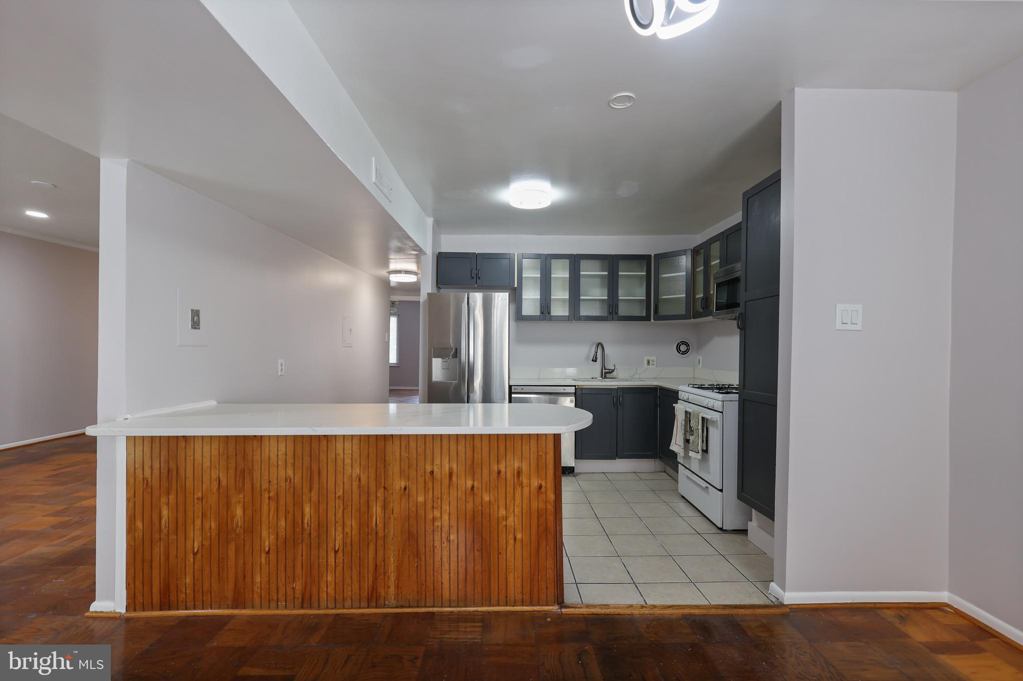 5050 7th Road South, Unit 301 Arlington, VA 22204 - Photo 6 of 20 a view of a living room with a sink