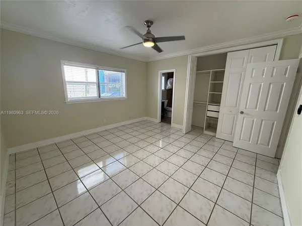 a view of an empty room and window