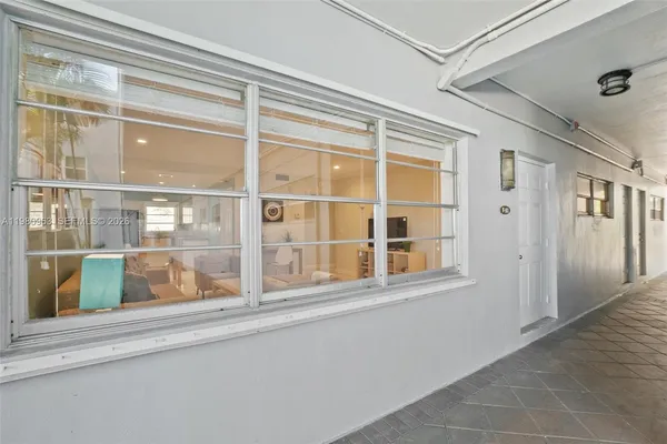a view of empty room with a window