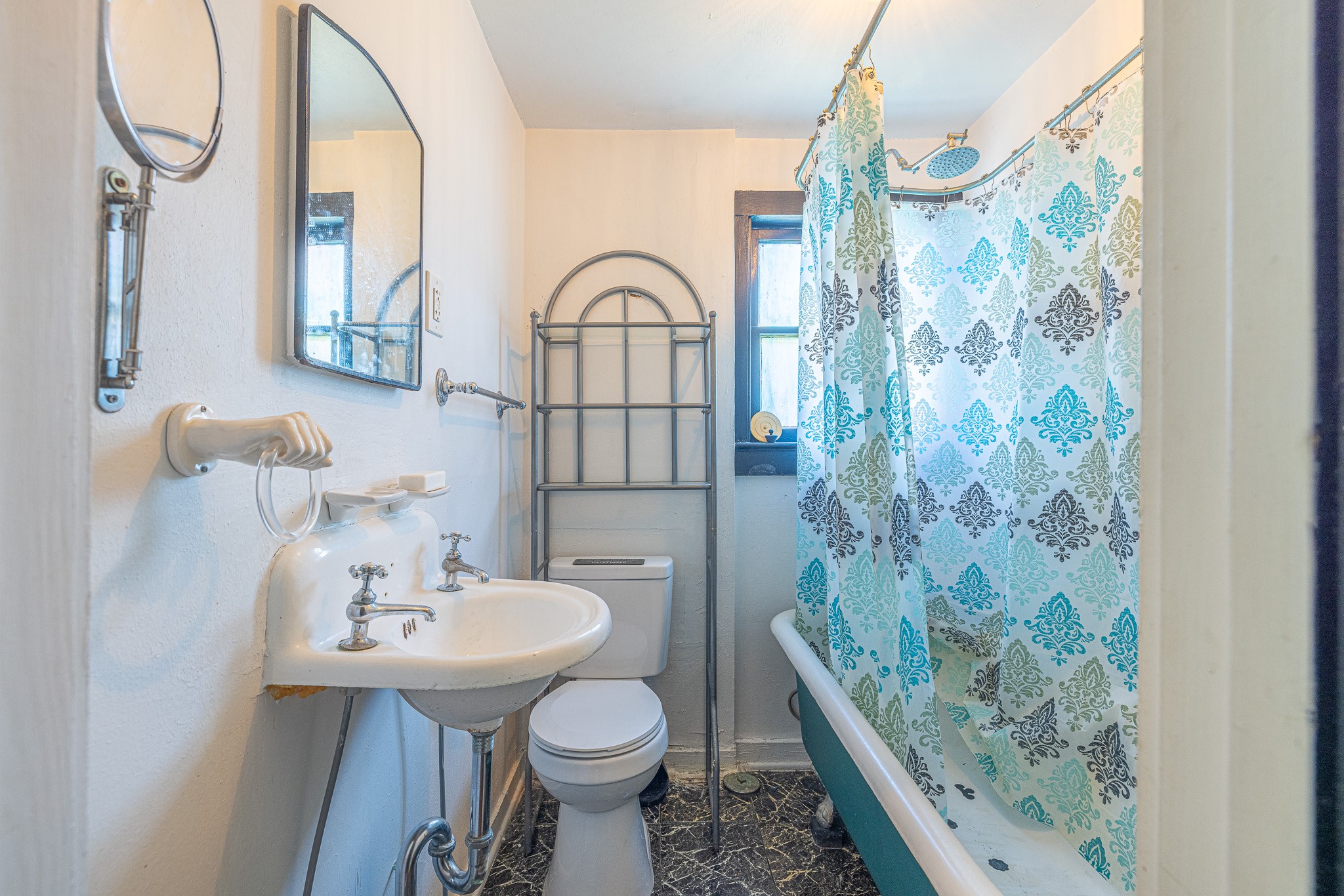 8548 Findlay Street Houston, TX 77017 - Photo 46 of 50 a bathroom with a sink toilet and a mirror