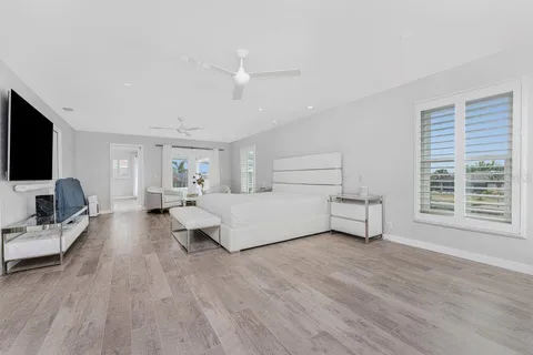 a view of a kitchen with fridge and rack