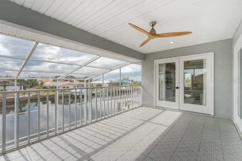 a bathroom with a double vanity sink a mirror and a bathtub