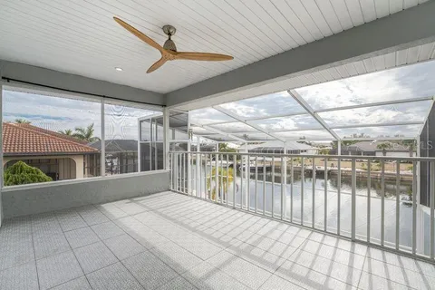 a bathroom with a granite countertop sink mirror and shower
