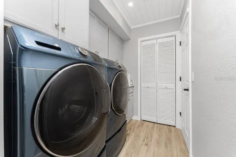 a view of swimming pool with outdoor seating