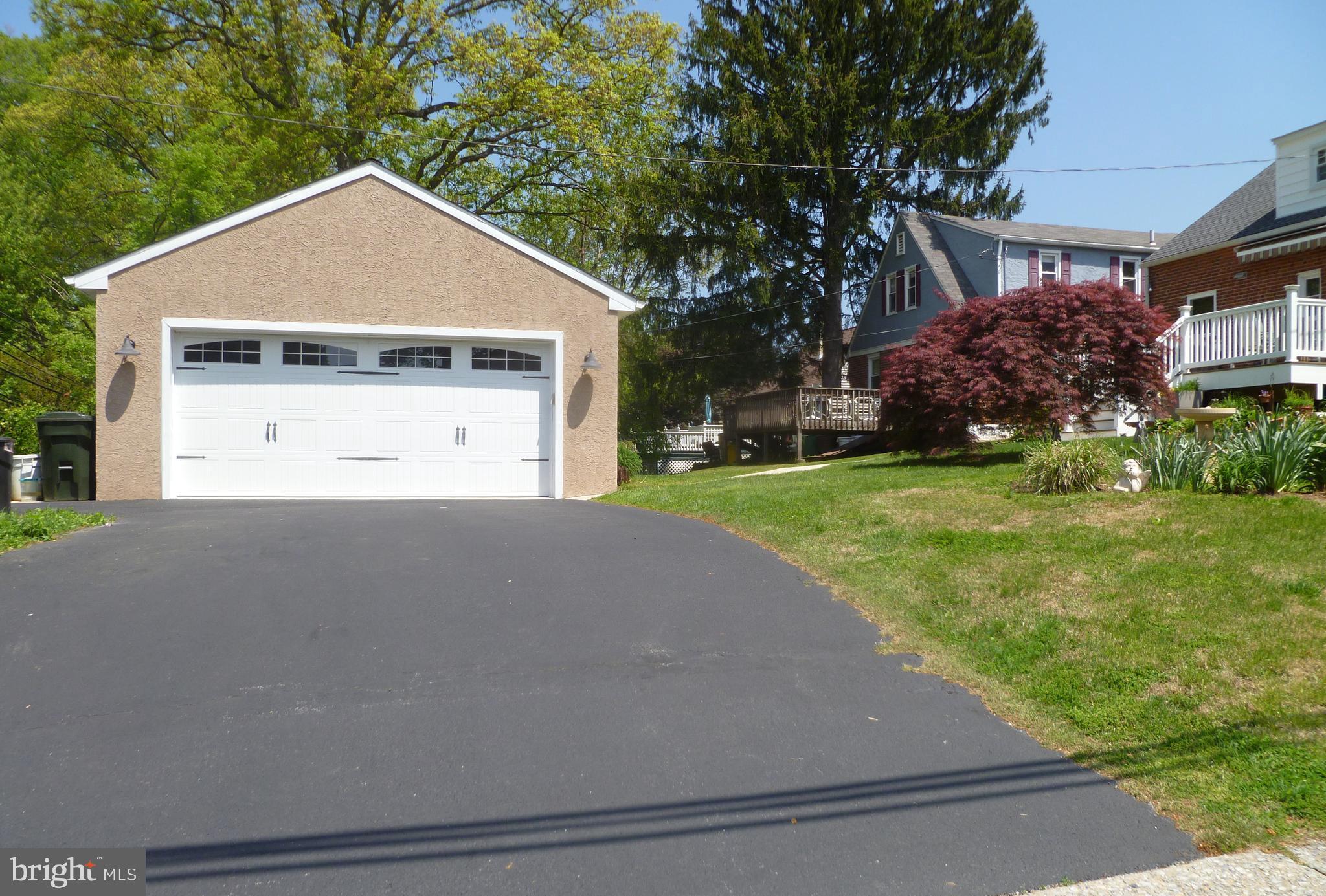 100 Barren Road Newtown Square, PA 19073 - Photo 22 of 32 a view of a house with a yard