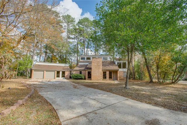 a house with trees in front of it