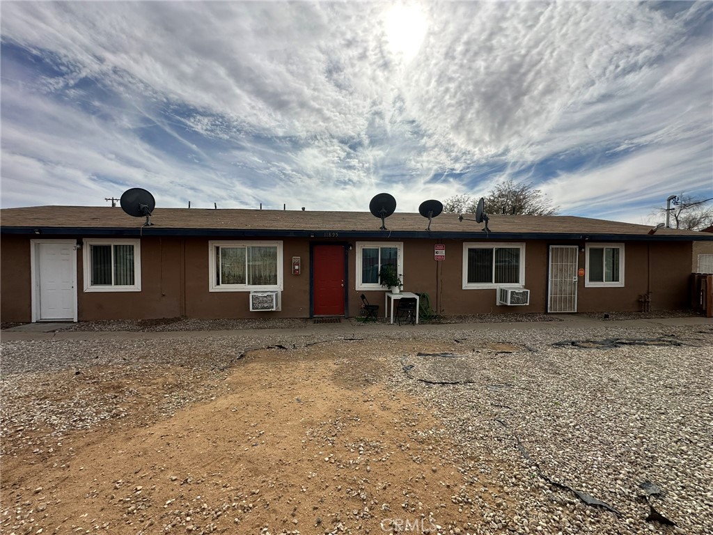 11895 White Avenue Adelanto, CA 92301 - Photo 15 of 21 front view of a house with a dry yard