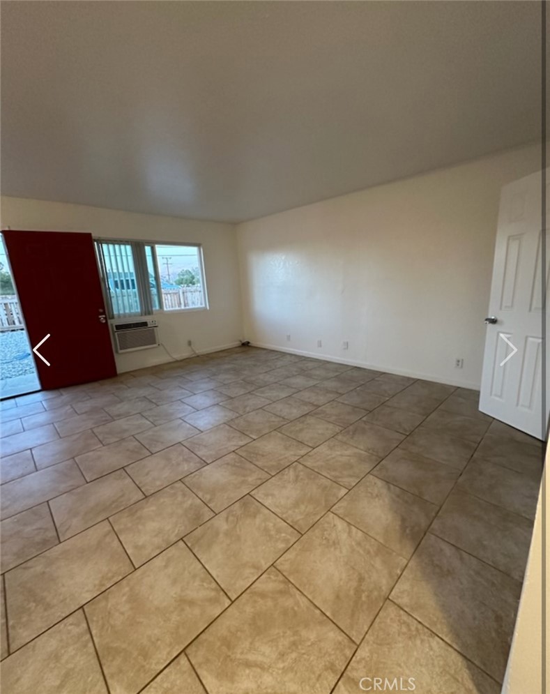 11895 White Avenue Adelanto, CA 92301 - Photo 19 of 21 an empty room with windows