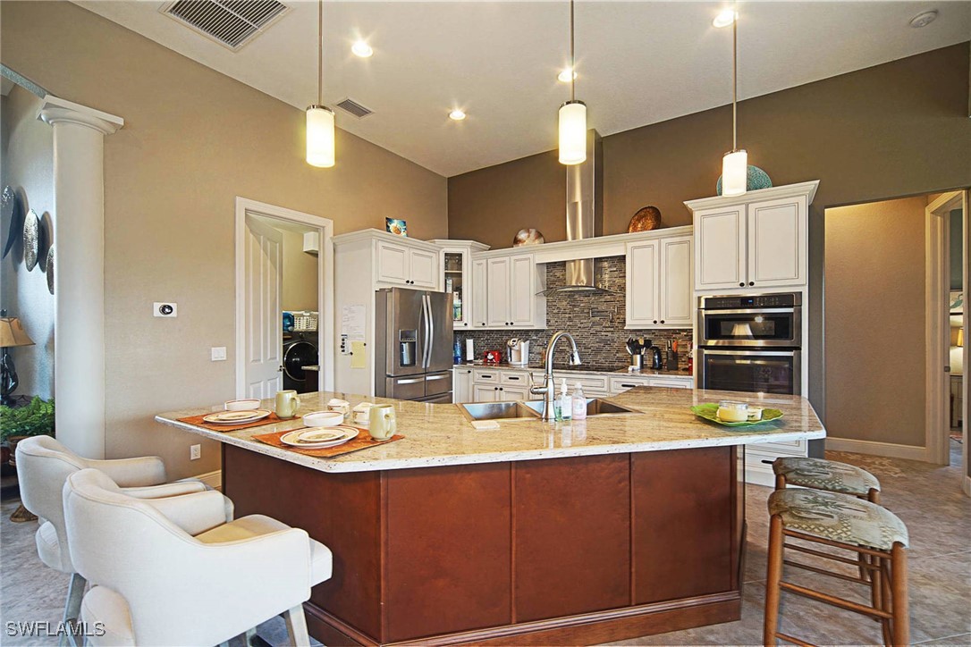 1502 Southwest 38th Street Cape Coral, FL 33914 - Photo 8 of 17 a view of a dining room with furniture