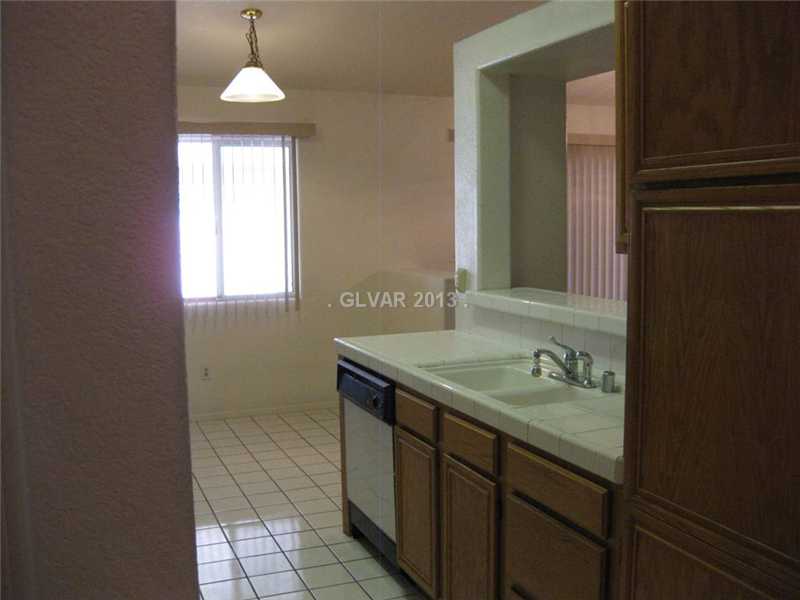 8620 Magnolia Ridge Avenue Las Vegas, NV 89134 - Photo 7 of 28 Kitchen.