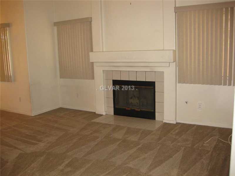 8620 Magnolia Ridge Avenue Las Vegas, NV 89134 - Photo 9 of 28 Living Room.