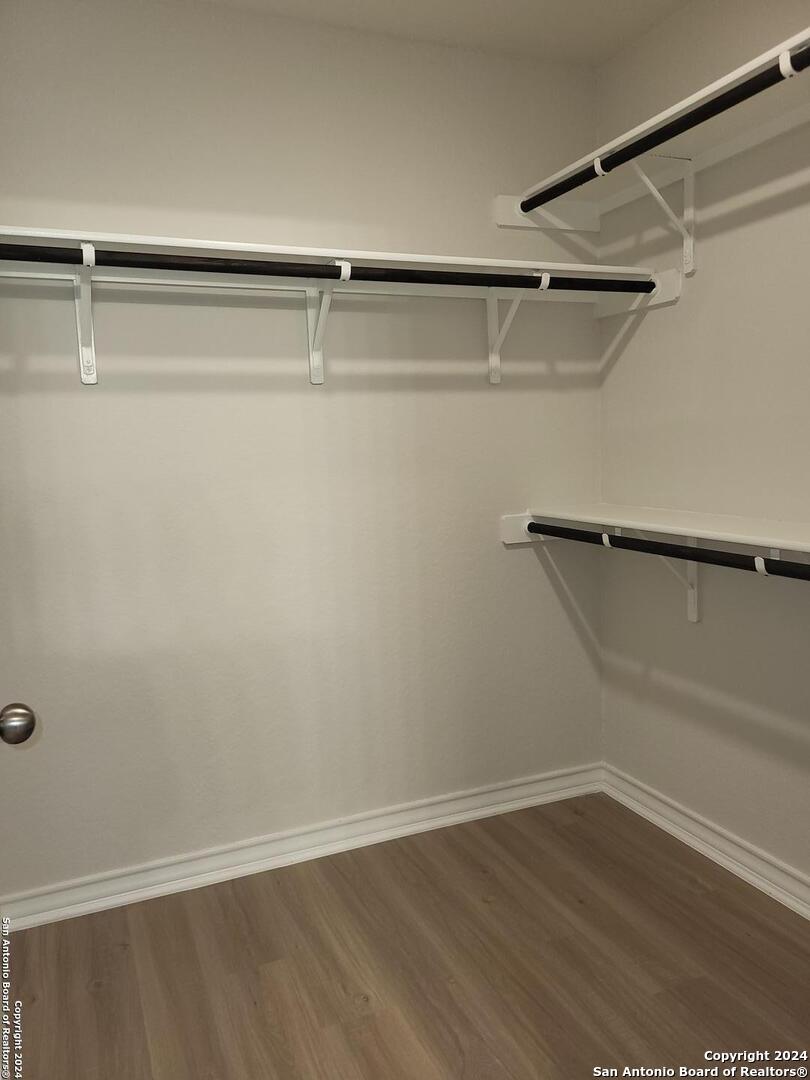 9519 River Rye San Antonio, TX 78254 - Photo 21 of 28 a view of small space with racks on the wall