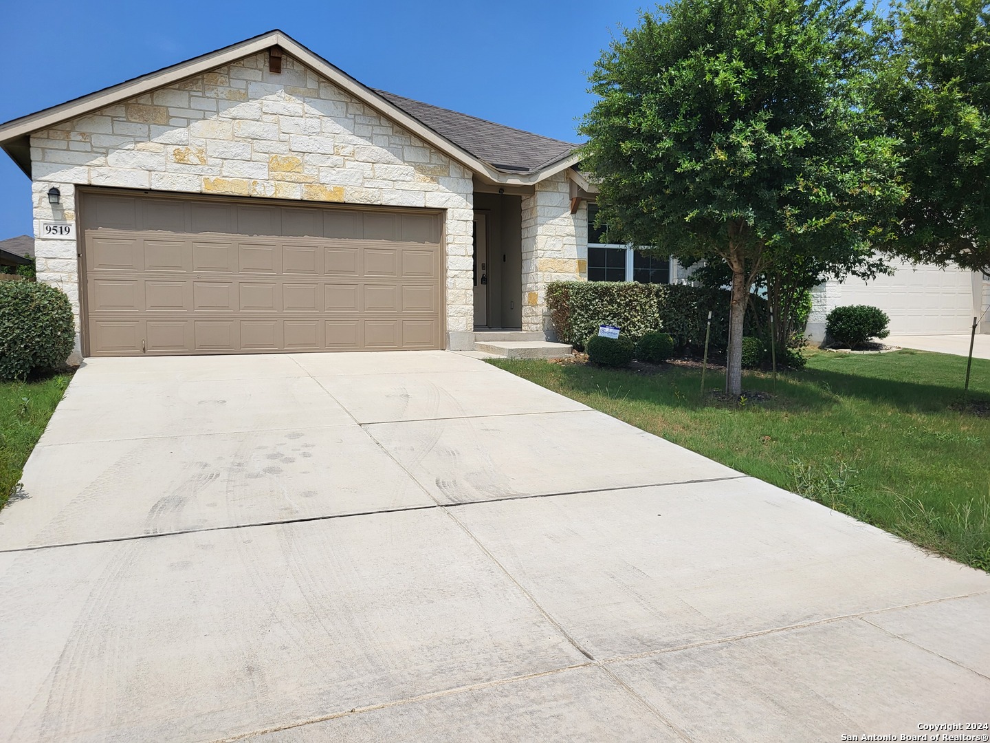 9519 River Rye San Antonio, TX 78254 - Photo 3 of 28 a front view of a house with garden