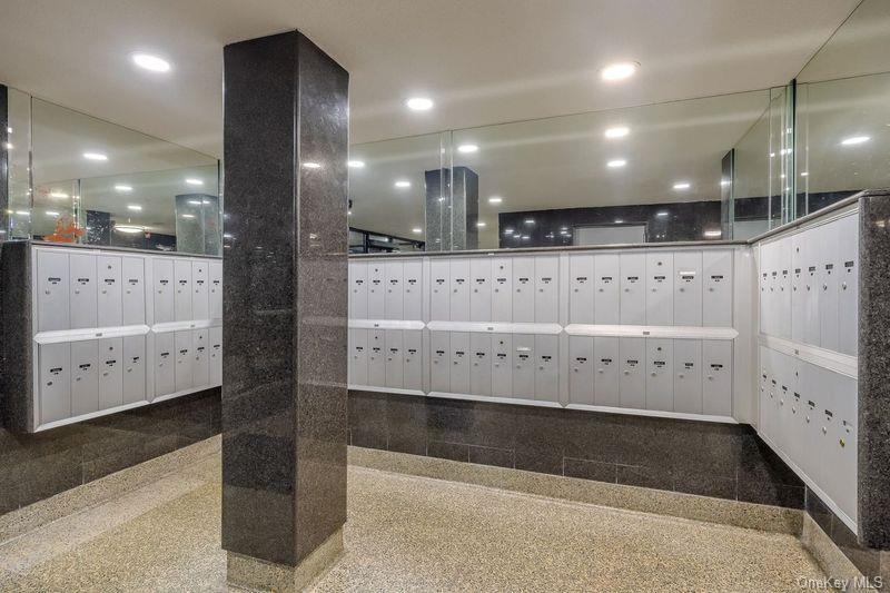 88-25 155th Avenue, Unit 4G Queens, NY 11414 - Photo 8 of 8 View of property's community with mail area and recessed lighting