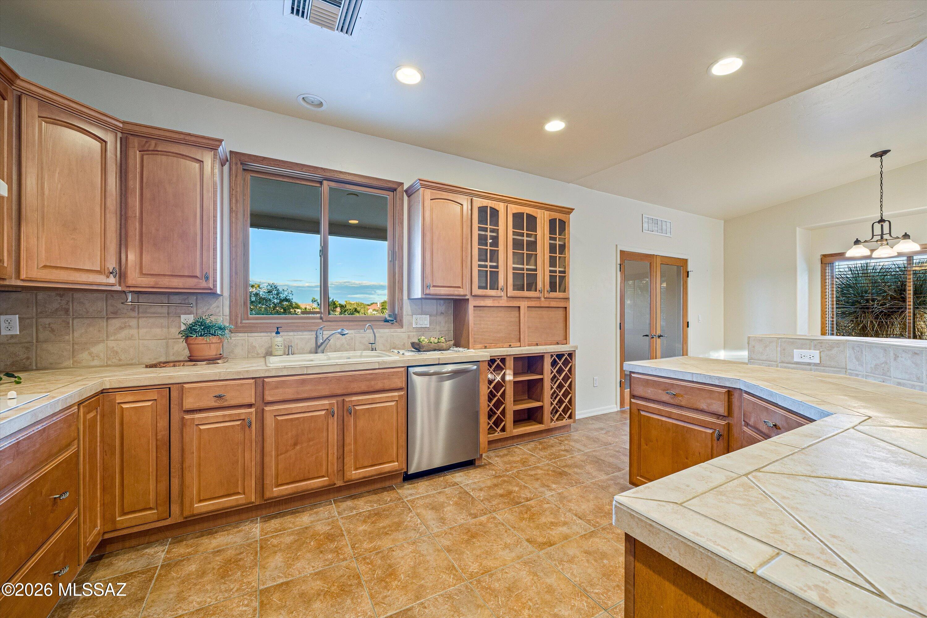 240 Sharon Road Vail, AZ 85641 - Photo 9 of 43 Spotless kitchen with abundant cabinetry
