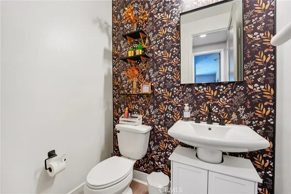 a bathroom with a shower and a sink