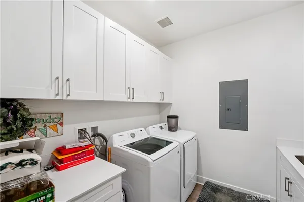 a view of a swimming pool with a table and chairs