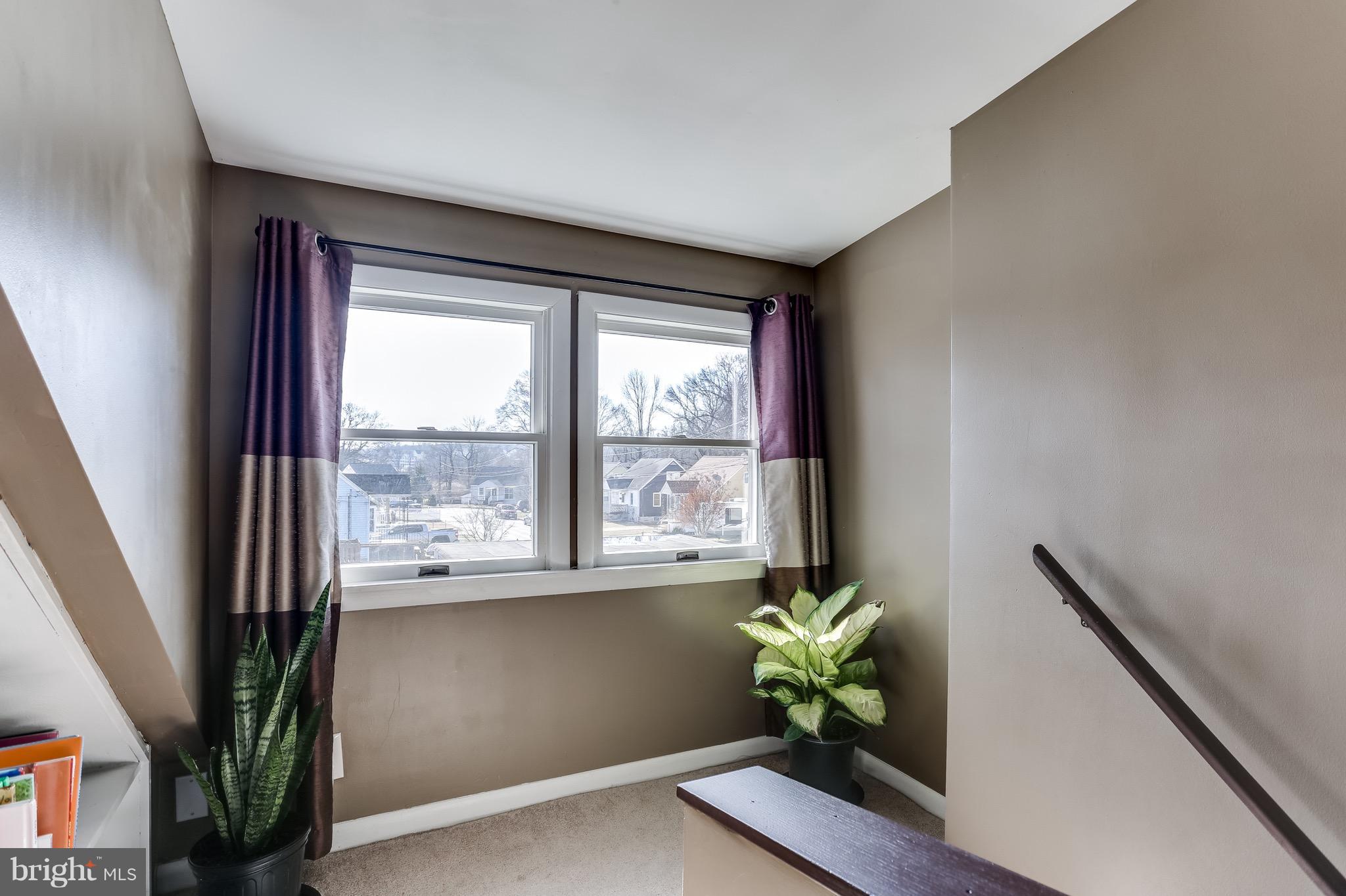 2015 Oakland Road Baltimore, MD 21220 - Photo 22 of 30 a view of a workspace with furniture and a window