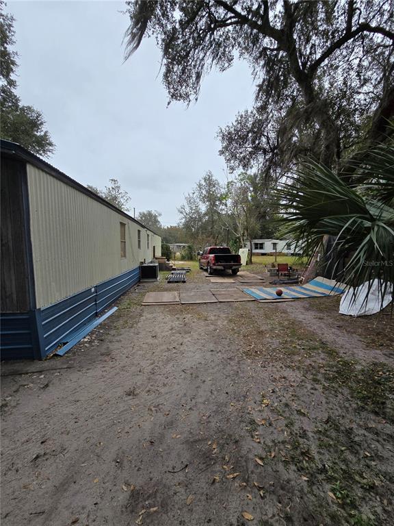 20 Southwest 3rd Street Webster, FL 33597 - Photo 5 of 5 a view of street with parked cars