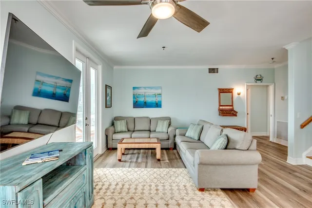 a living room with furniture and a couch