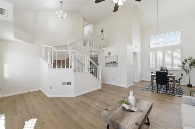 a kitchen with a sink stove and microwave
