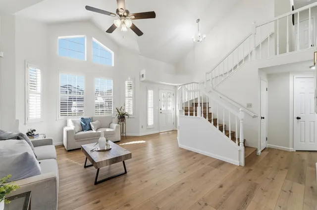 a kitchen with a stove a sink and a refrigerator