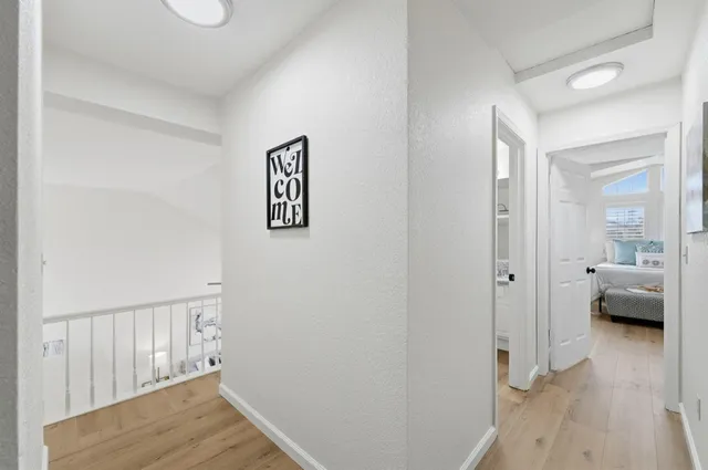 a bedroom with a bed and a table