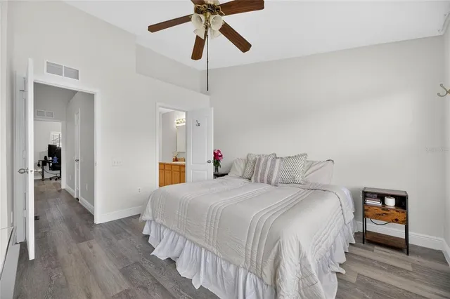 a view of a balcony with lake view and a couches