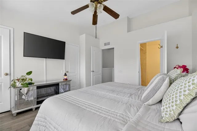 a room with furniture and a large window