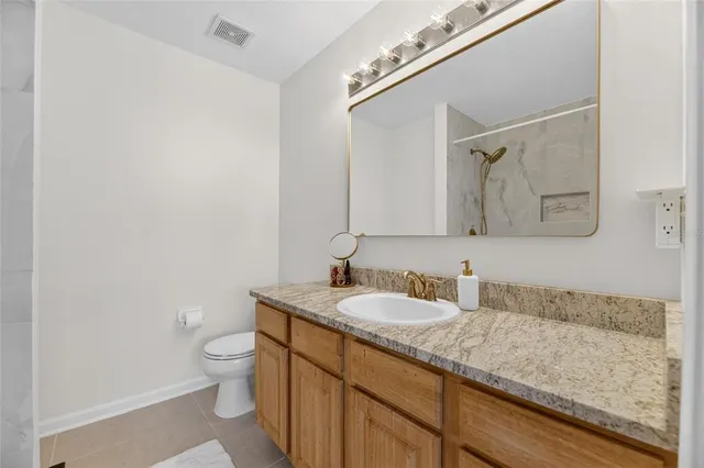 a house view with swimming pool in front of it