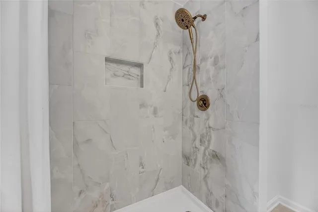 a front view of building with trees