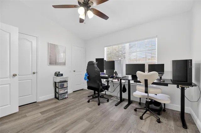 a front view of a house with a yard and a garage